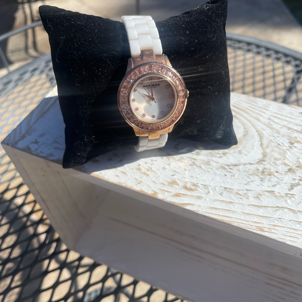 Anne Klein White Ceramic Bracelet Watch with Rose Gold Crystal Bezel AKRIBOS